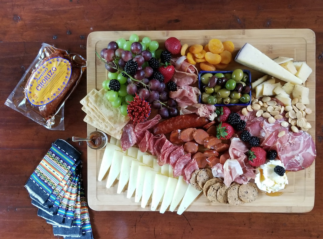 Charcuterie Board featuring Aurelia's Spanish Chorizo, manchego cheese and an assortment of fruits & nuts.