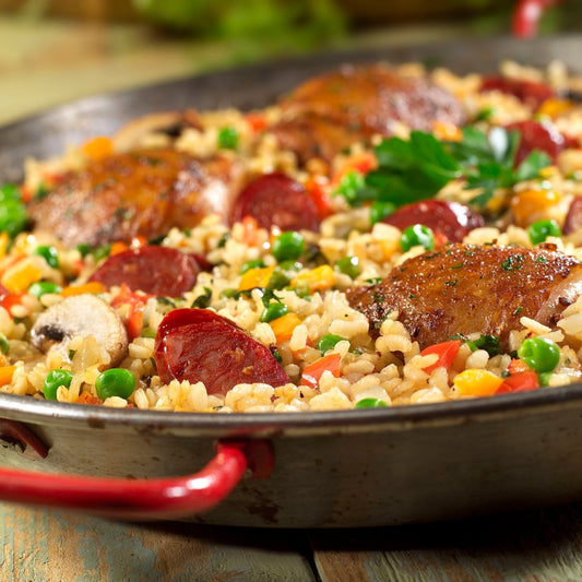 Closeup of Paella Pan with Spanish Chorizo, Chicken & Mushrooms